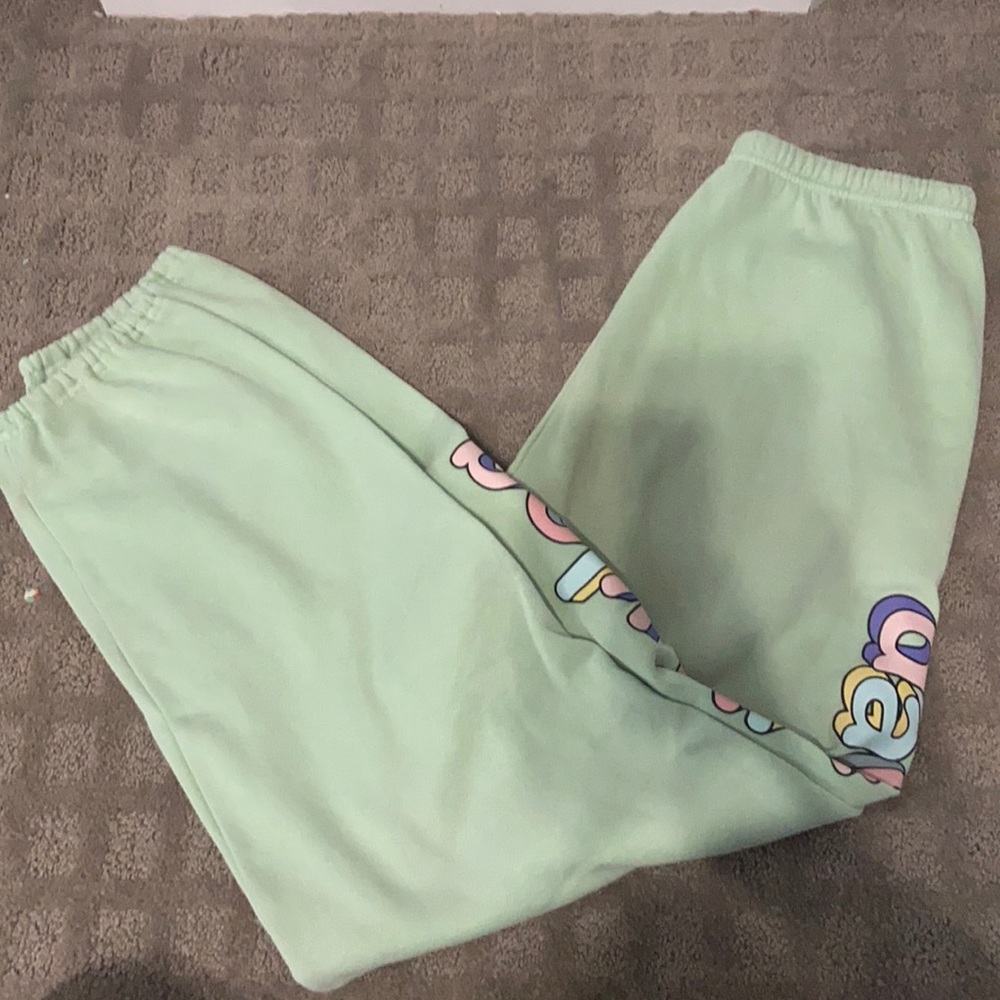 Green sweatpants